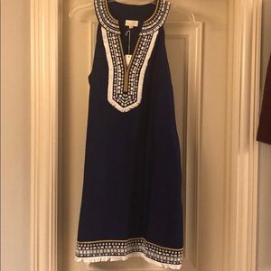 Navy Mudpie dress with white and yellow embroidery